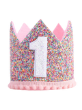 Pink glitter number 1 birthday crown for dogs from The Barkery Las Vegas colorful pet party hat.