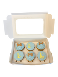 Dog cupcakes with optional custom number decoration in a bakery box