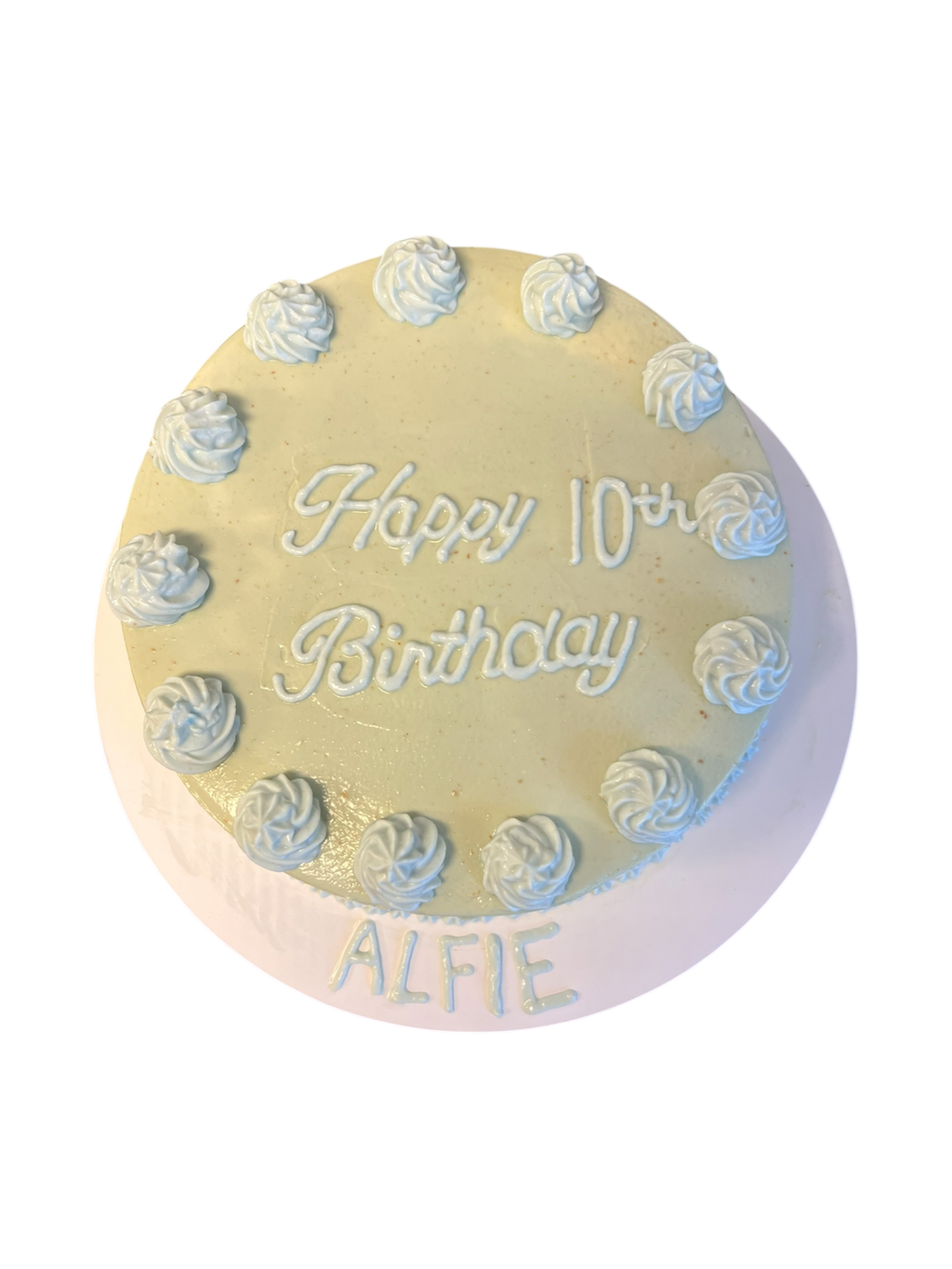 Customizable dog birthday cake with piped frosting and editable name