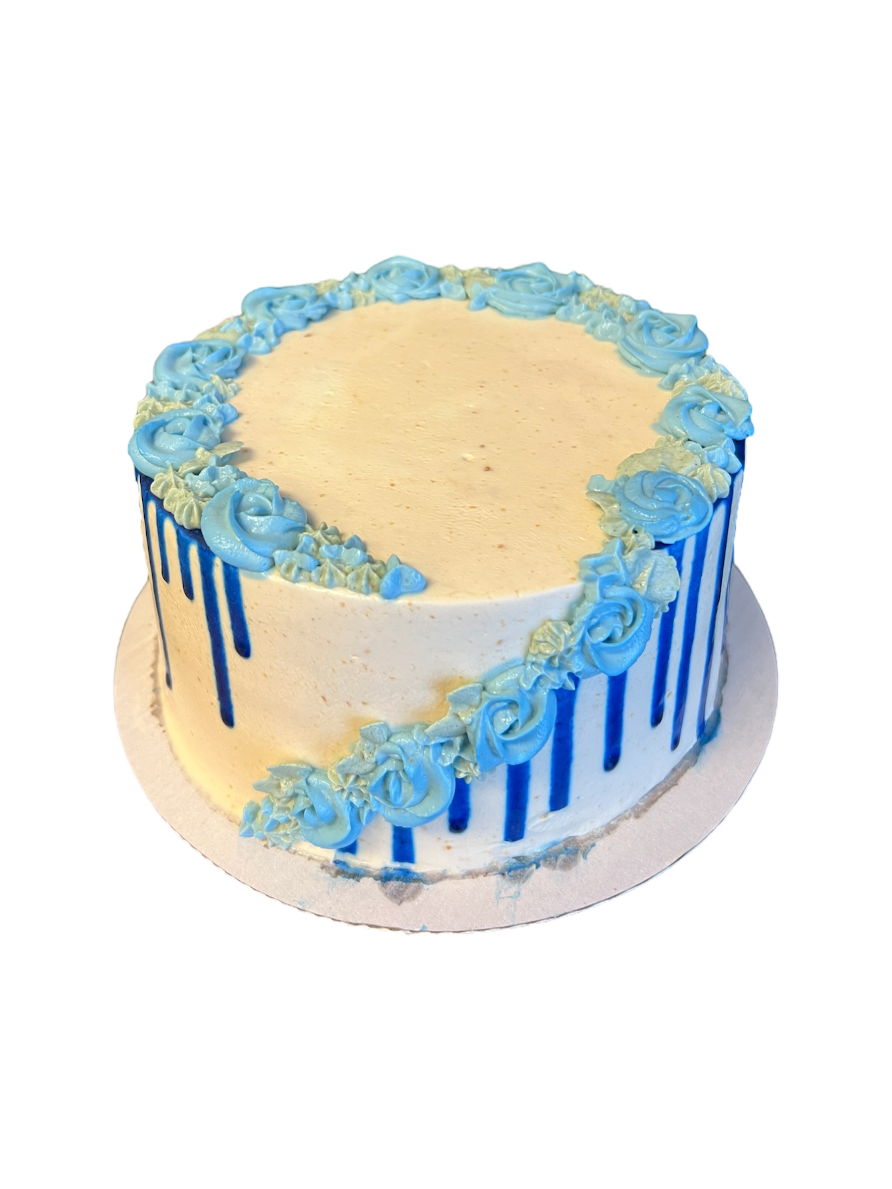 Custom flower drip dog cake with floral decorations and pastel frosting from The Barkery Las Vegas handmade birthday cake for dogs.