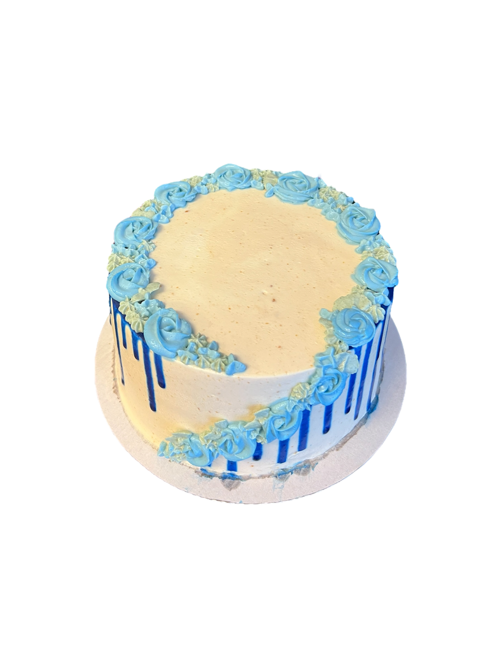 Custom flower drip dog cake with floral decorations and pastel frosting from The Barkery Las Vegas handmade birthday cake for dogs.