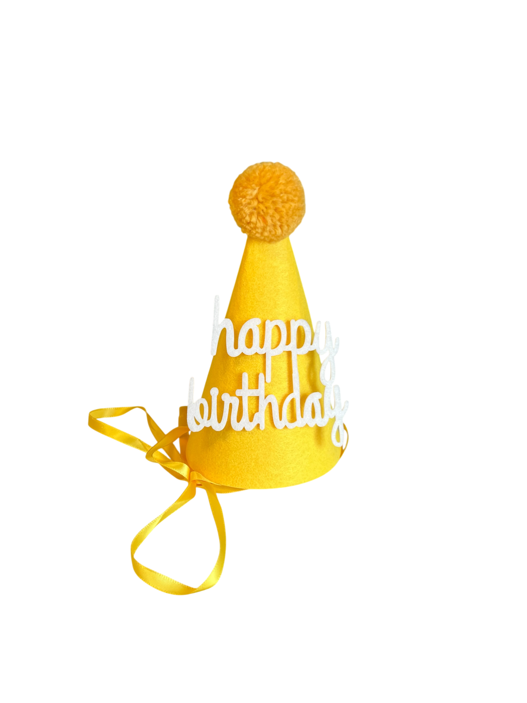Yellow birthday hat for dogs from The Barkery Las Vegas fun pet party accessory