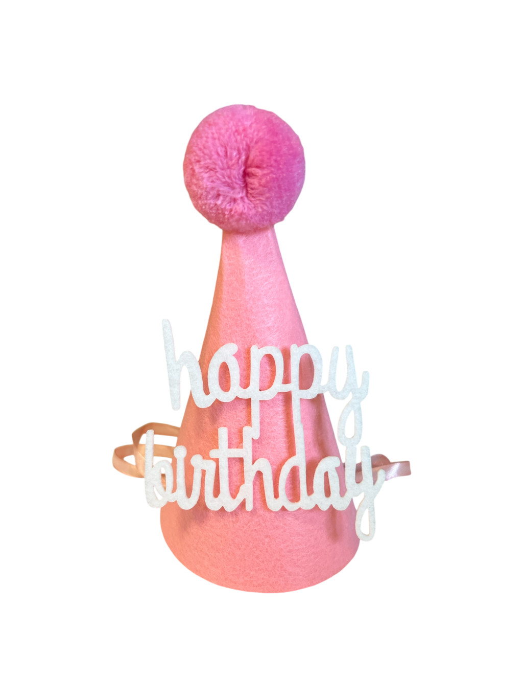 Pink birthday hat for dogs from The Barkery Las Vegas fun pet party accessory