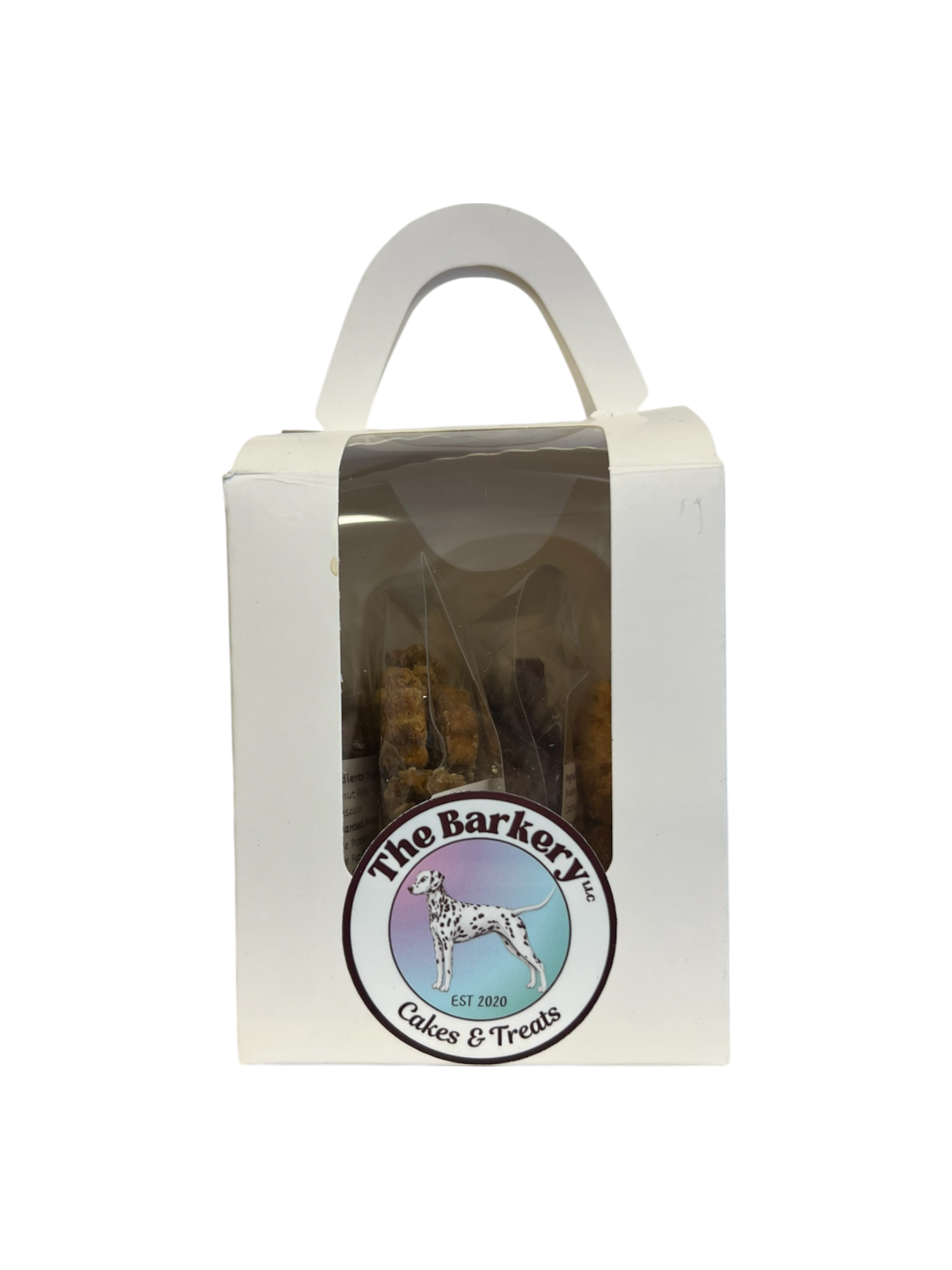 Assorted variety box of vegan dog treats from The Barkery Las Vegas made with organic plant-based ingredients.