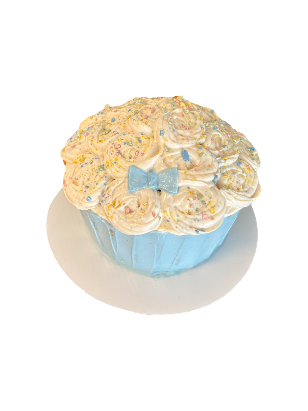 Custom giant cupcake dog cake with swirled frosting, pastel sprinkles, and blue bow from The Barkery Las Vegas handmade pet birthday cake.