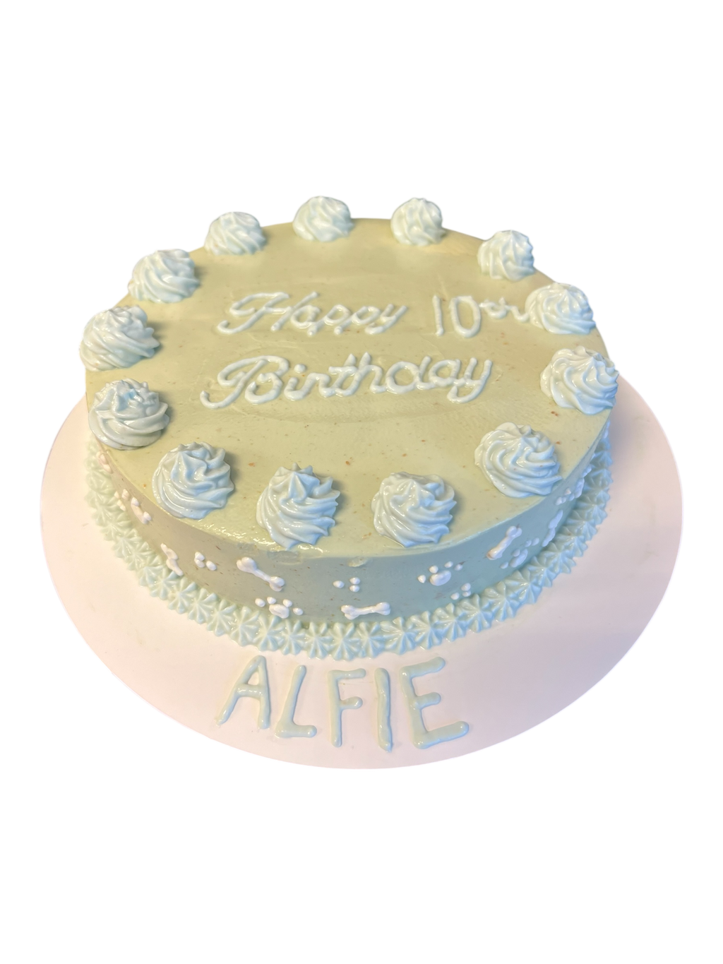 Customizable dog birthday cake with piped frosting and editable name