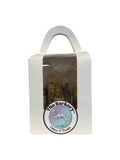 Assorted variety box of vegan dog treats from The Barkery Las Vegas made with organic plant-based ingredients.
