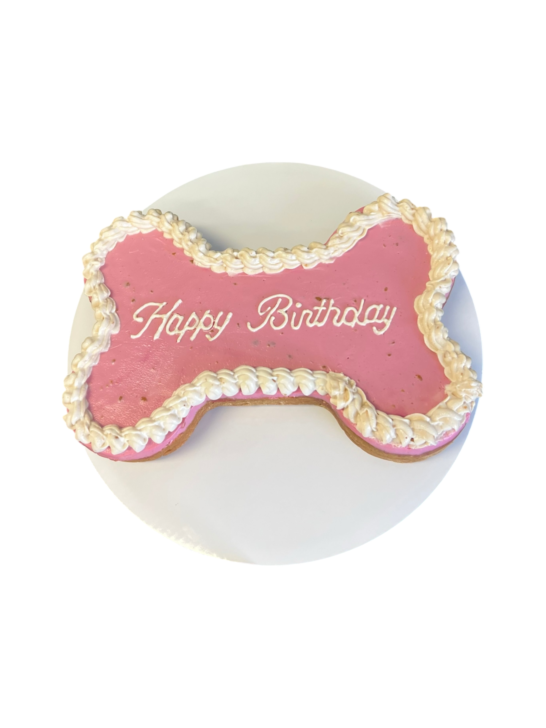 Bone Dog Cake with pink icing and Happy Birthday written on top, perfect for dog celebrations