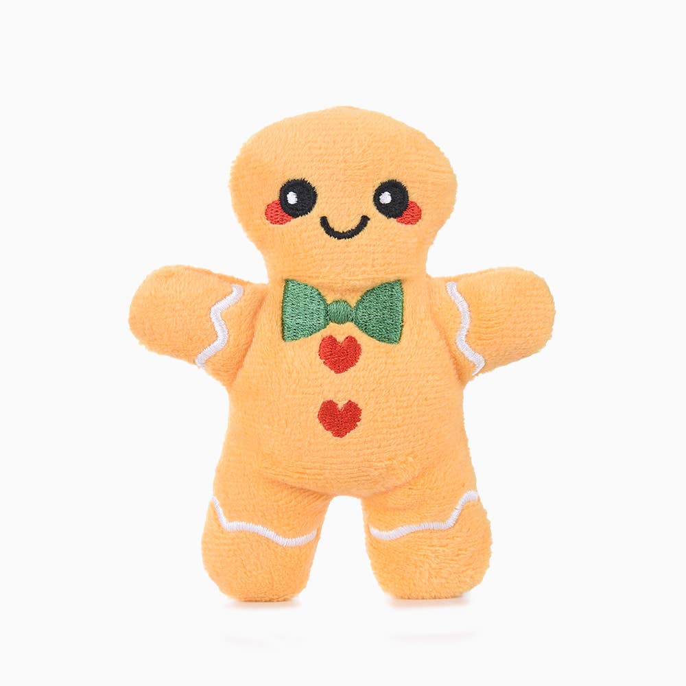 Cute gingerbread latte dog toy plush with smiling face and colorful details for playful pets