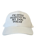 White cap featuring embroidered text I'm only talking to my dog Today for dog lovers