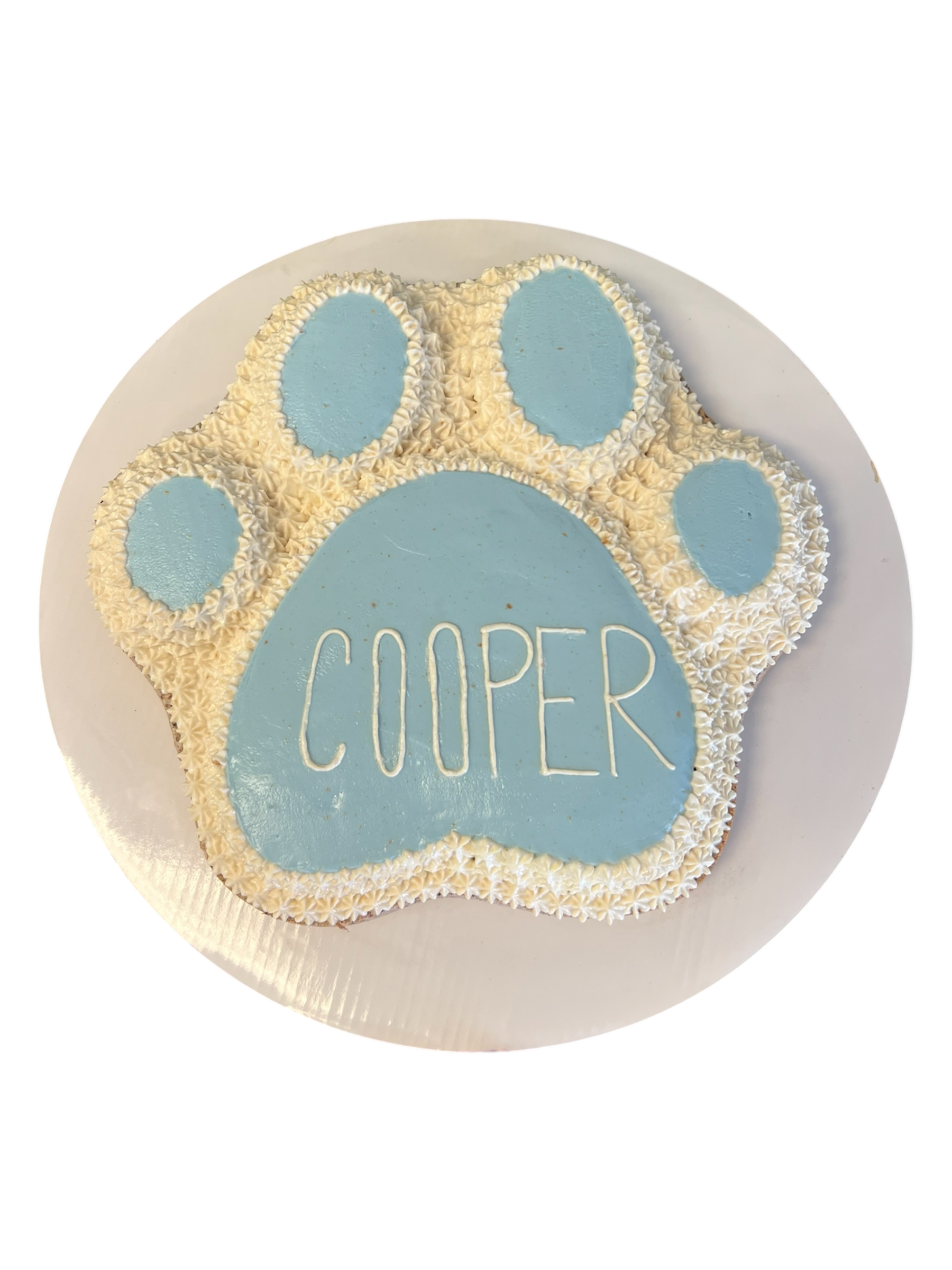Paw print dog cake in blue and white with the name Cooper, perfect for pet celebrations