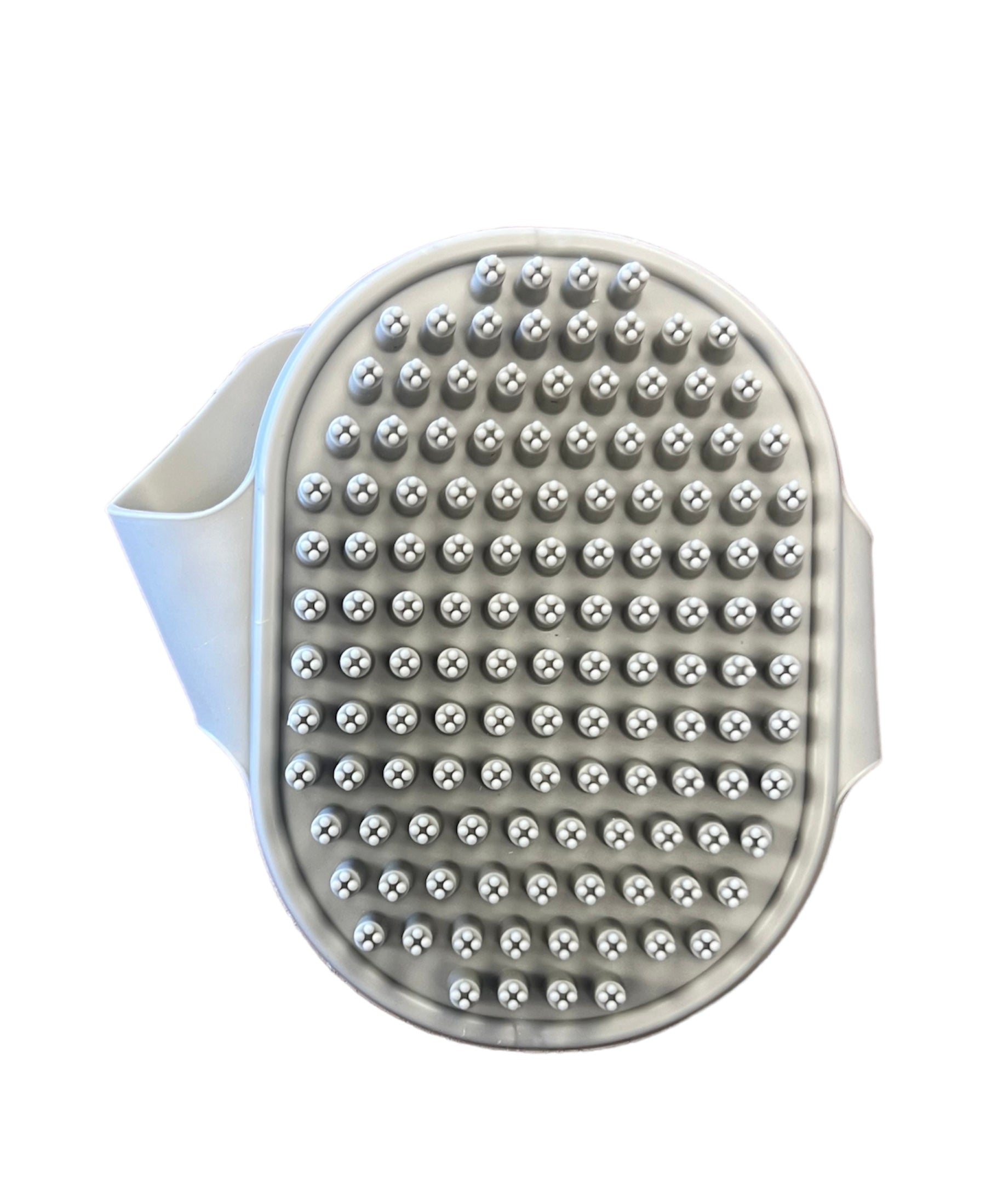 Rubber dog shower brush in white with soft bristles for effective grooming and bathing