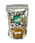 The Barkery LLC Organic Pumpkin Dog Treats in a 8oz resealable bag for healthy pet snacking