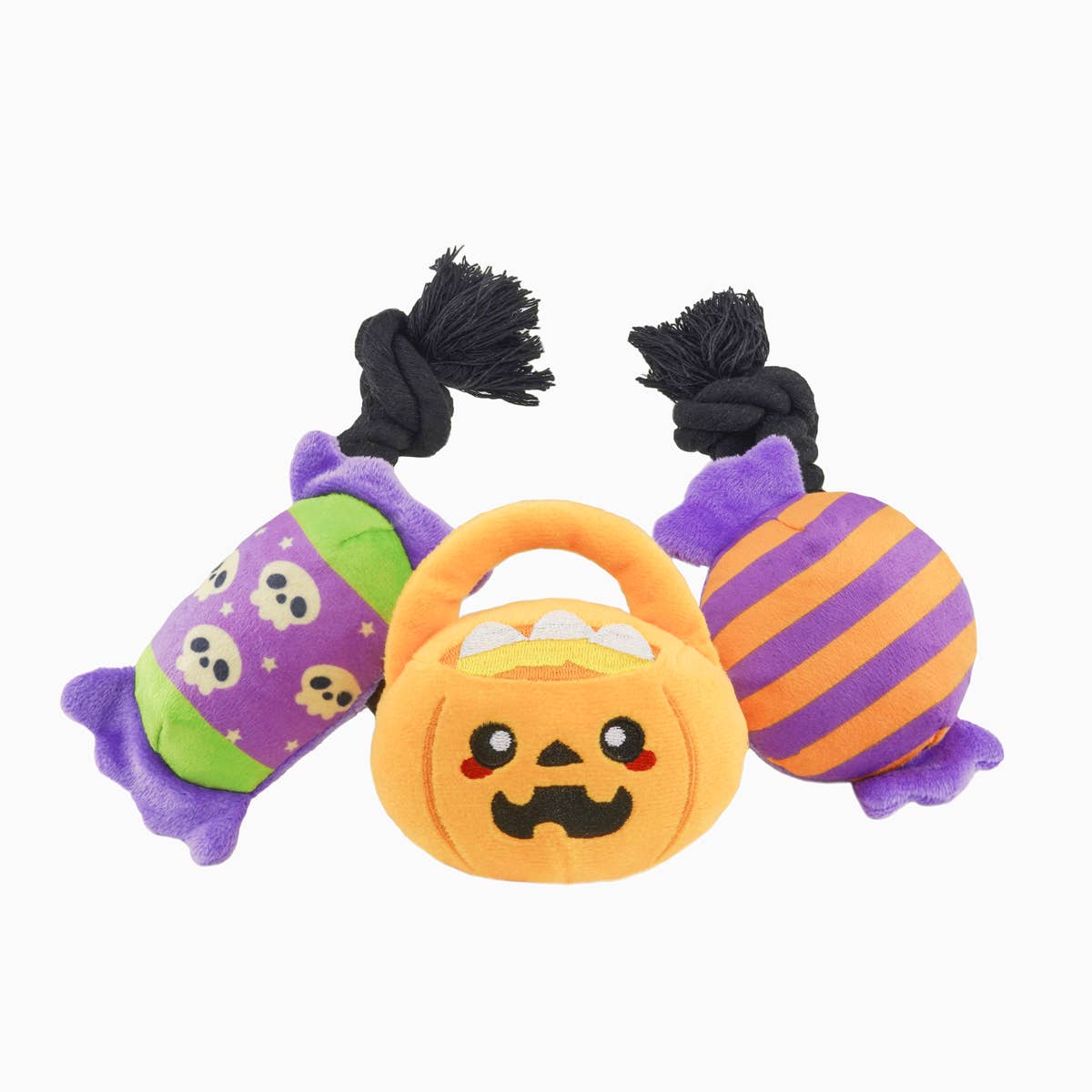 Halloween dog toy set featuring plush pumpkin and candy designs with squeakers for playful pets